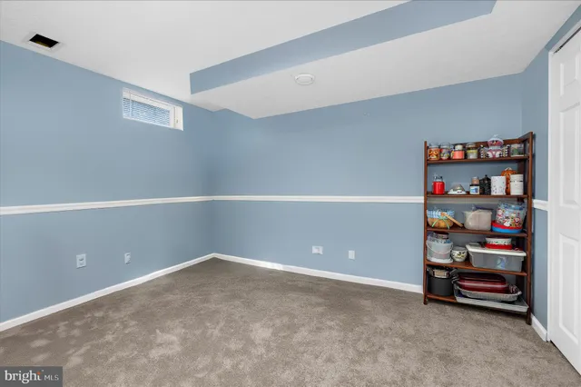 a kitchen with a sink a cabinets and window