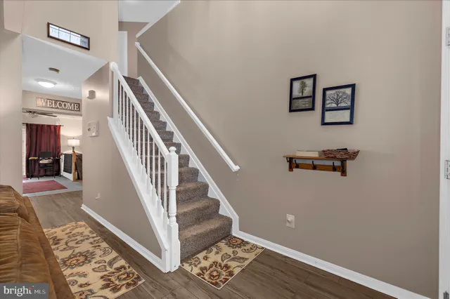 a view of entryway with wooden floor
