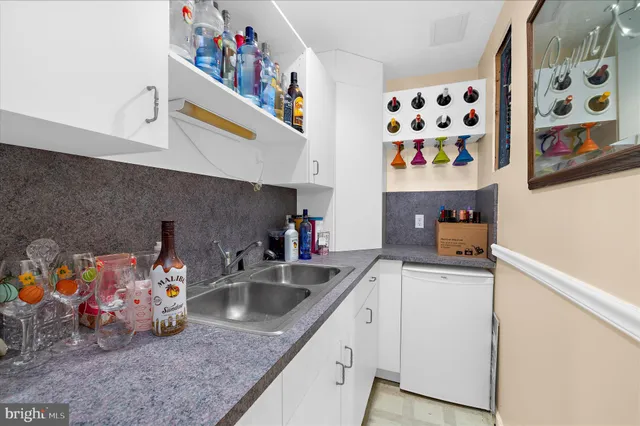 a bathroom with a toilet and a sink