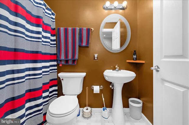 a view of a backyard with swimming pool