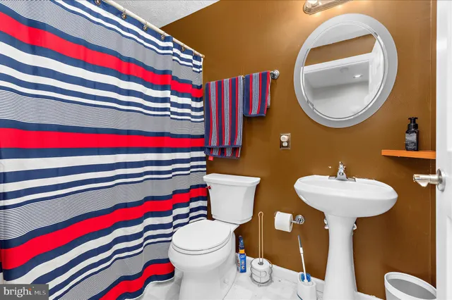 a patio with table and chairs