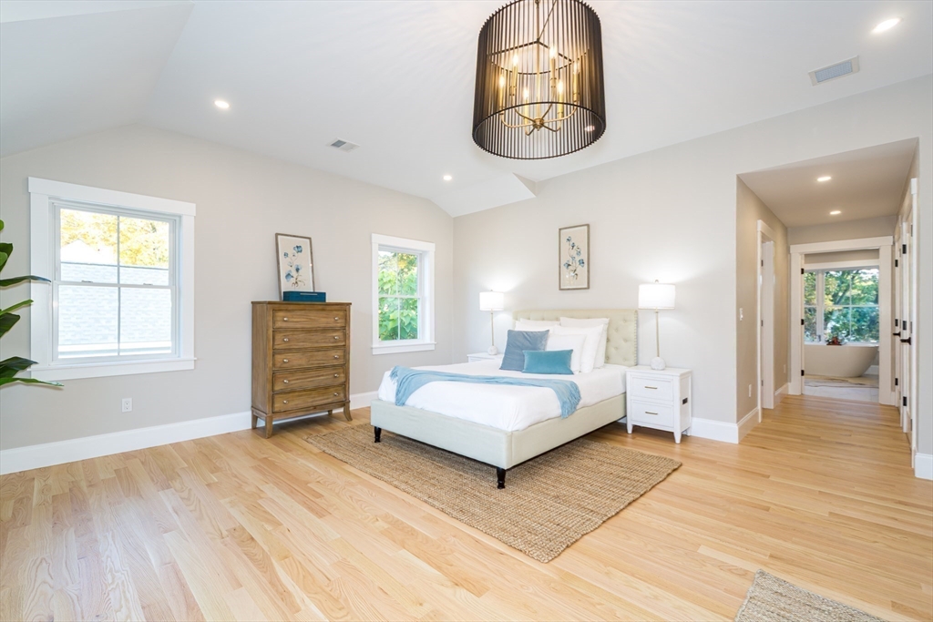 3 Ferndale Road Natick, MA 01760 - Photo 22 of 40 a spacious bedroom with a bed and window