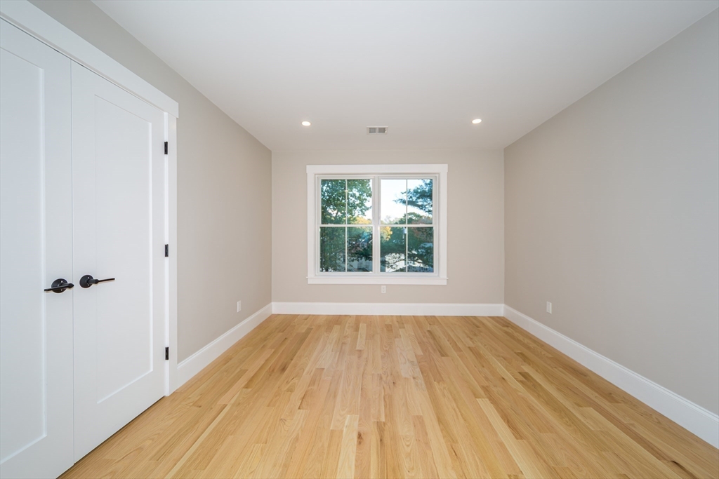 3 Ferndale Road Natick, MA 01760 - Photo 30 of 40 a view of a room has wooden floor and window