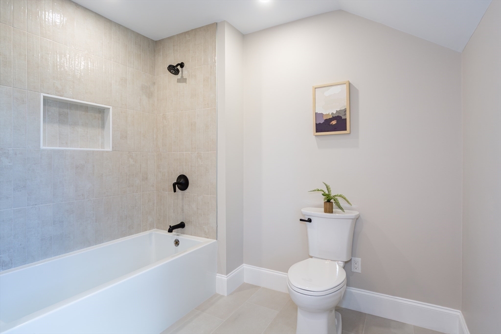 3 Ferndale Road Natick, MA 01760 - Photo 32 of 40 a bathroom with a sink a toilet and bathtub