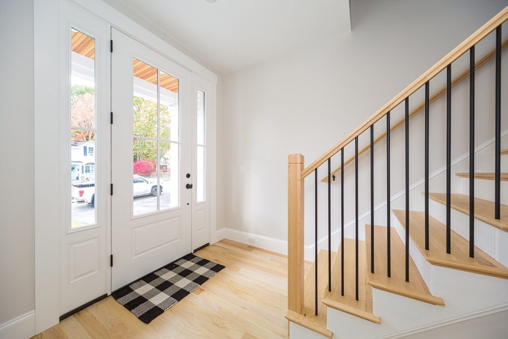 3 Ferndale Road Natick, MA 01760 - Photo 4 of 40 a view of an empty room and window
