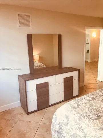 a view of a workspace with furniture