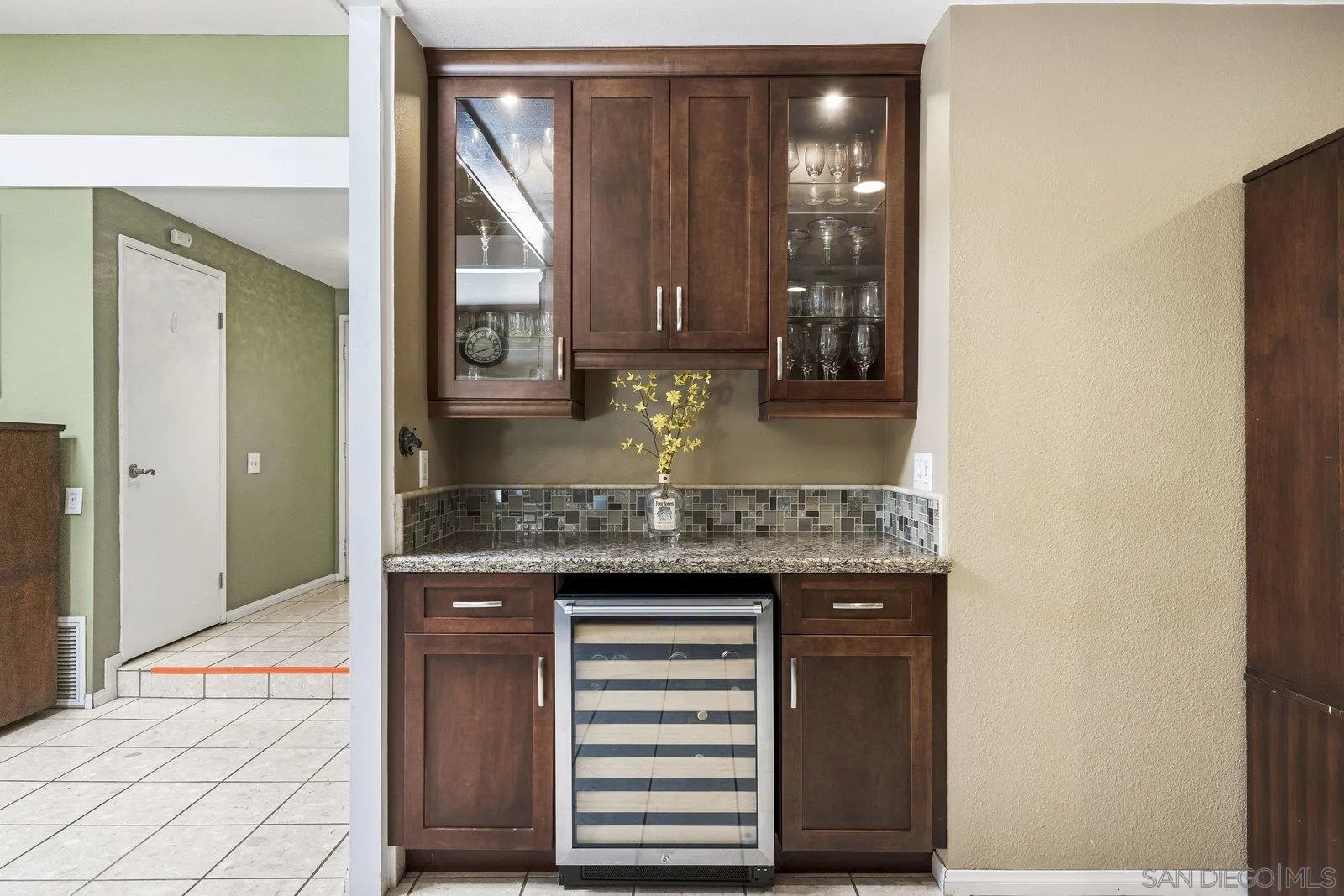 14152 Kendra Way Poway, CA 92064 - Photo 17 of 42 a bathroom with a granite countertop sink and a mirror