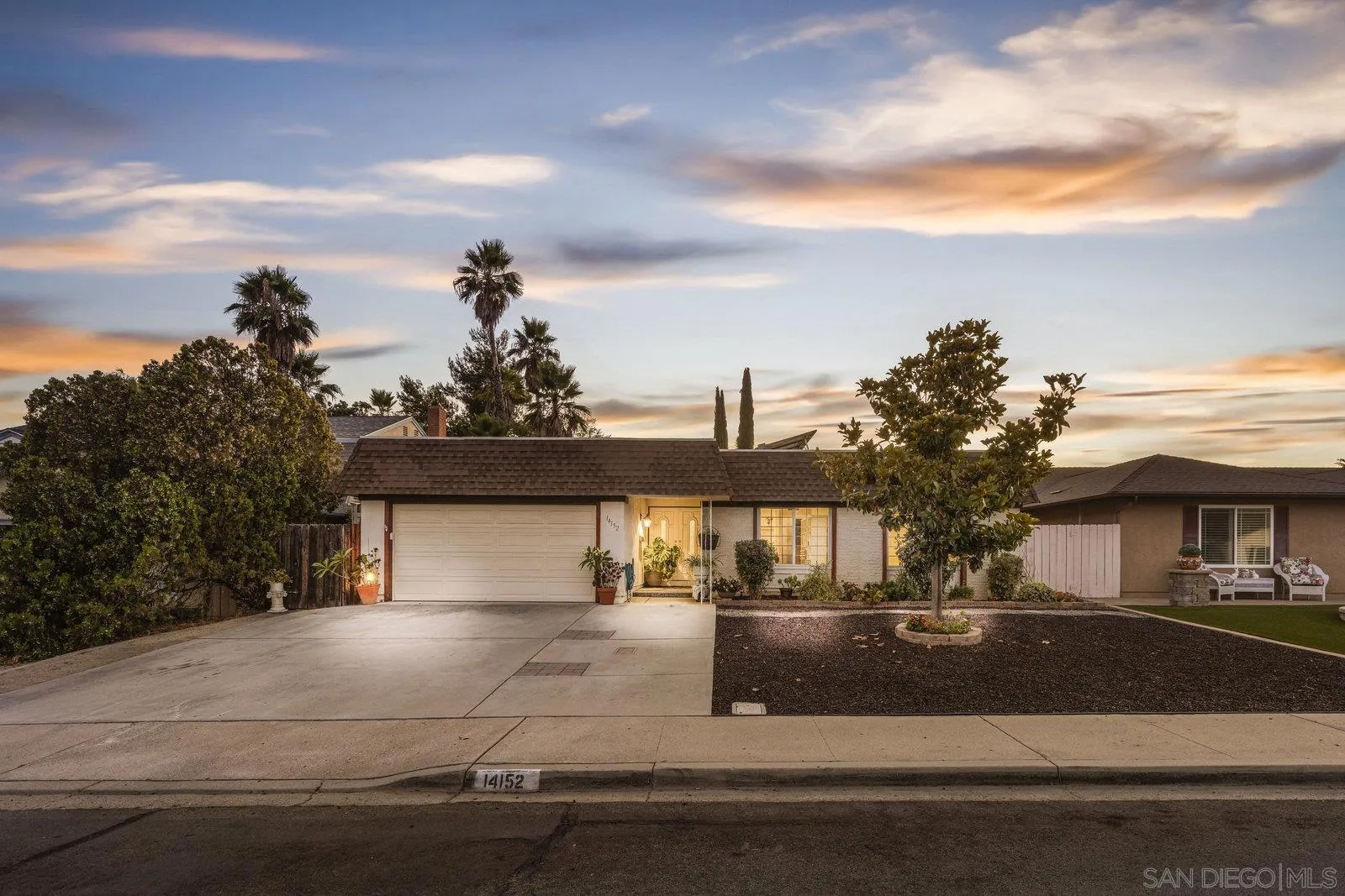 14152 Kendra Way Poway, CA 92064 - Photo 2 of 42 a front view of a house with a yard