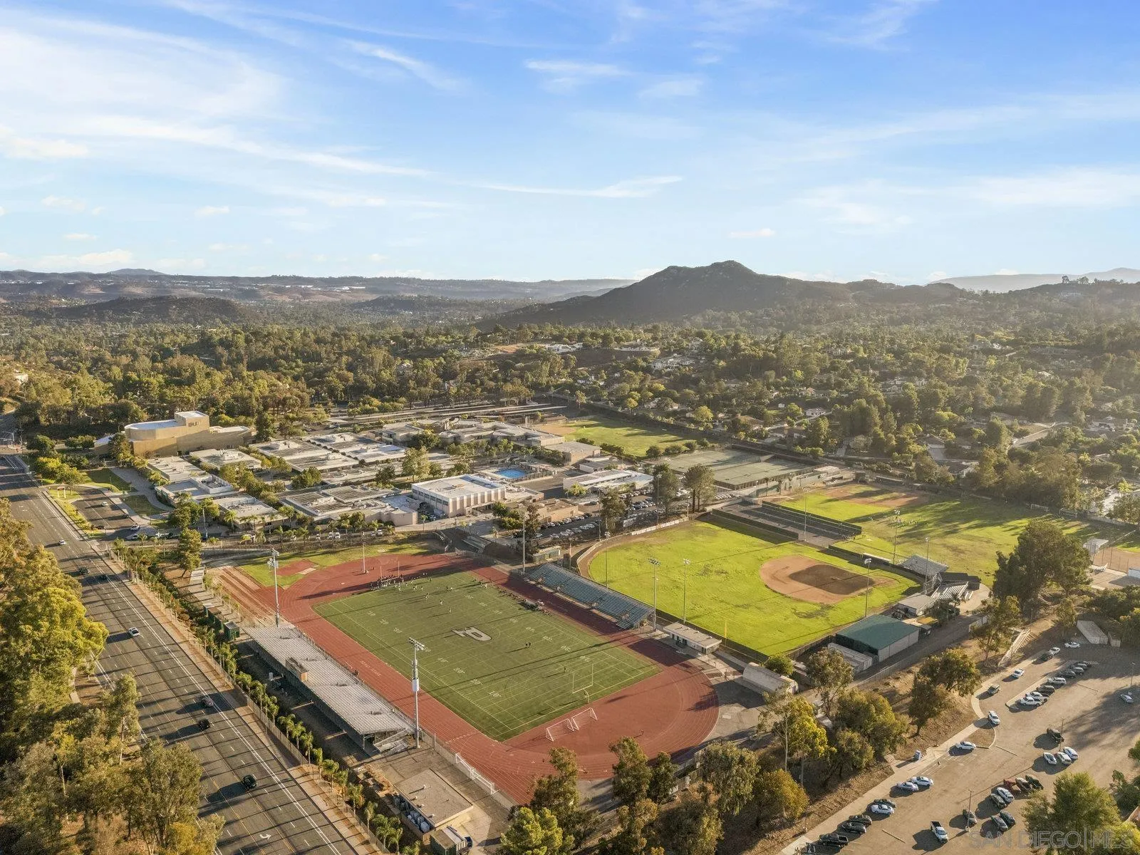 14152 Kendra Way Poway, CA 92064 - Photo 42 of 42 an aerial view of residential houses with outdoor space and swimming pool