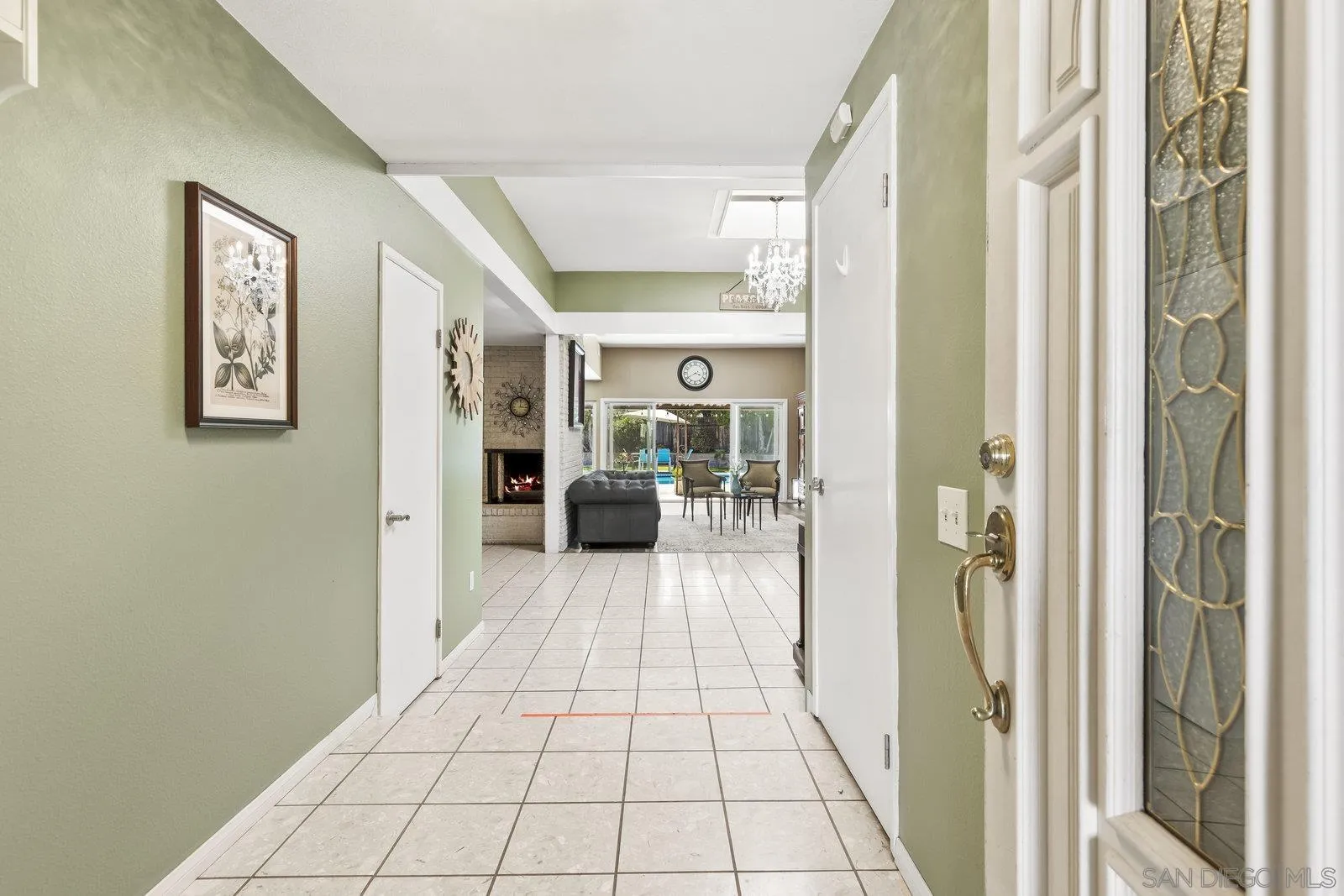 14152 Kendra Way Poway, CA 92064 - Photo 6 of 42 a hallway with a large mirror next to a window