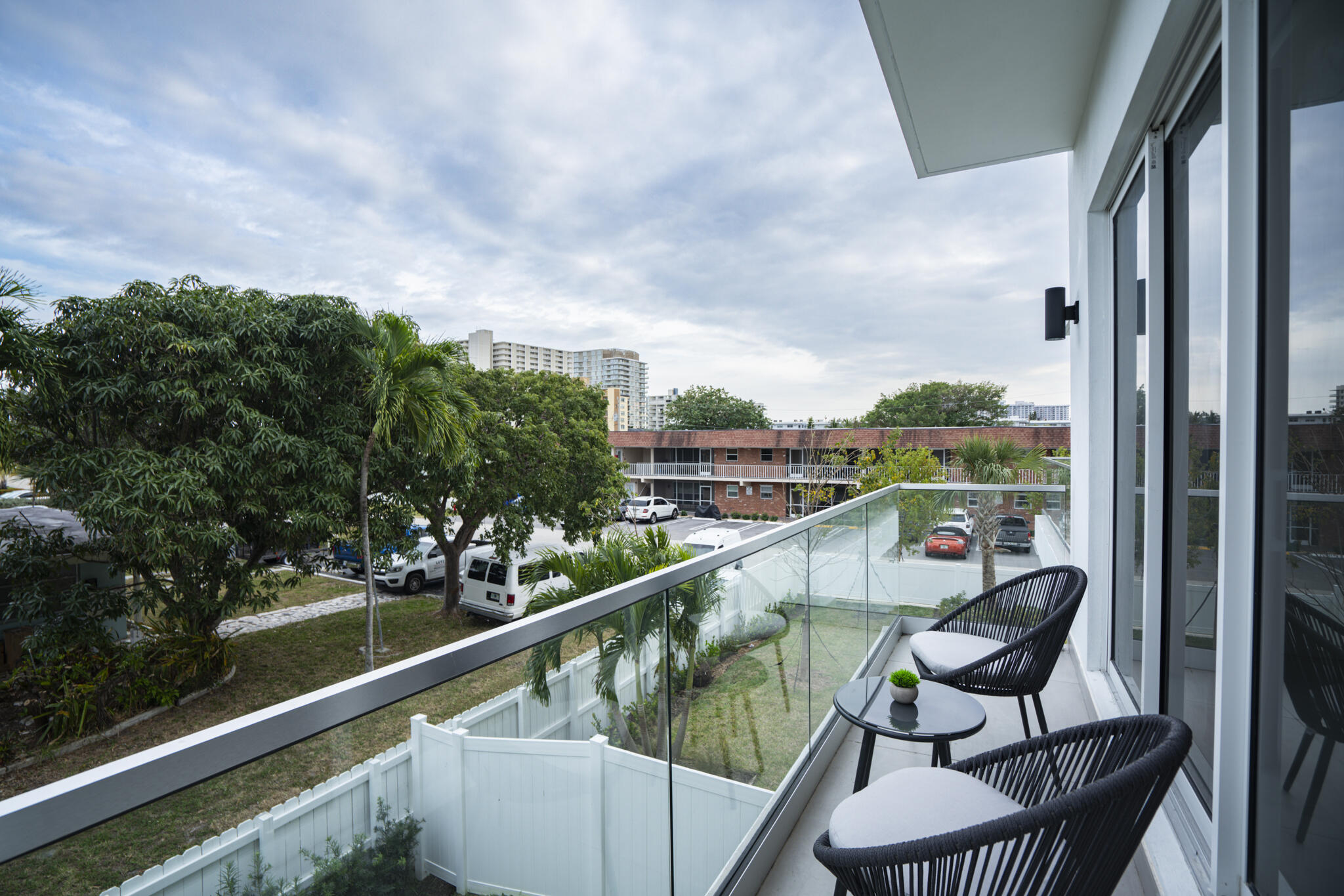 1000 North Riverside Drive Pompano Beach, FL 33062 - Photo 21 of 39 a view of a balcony with chairs
