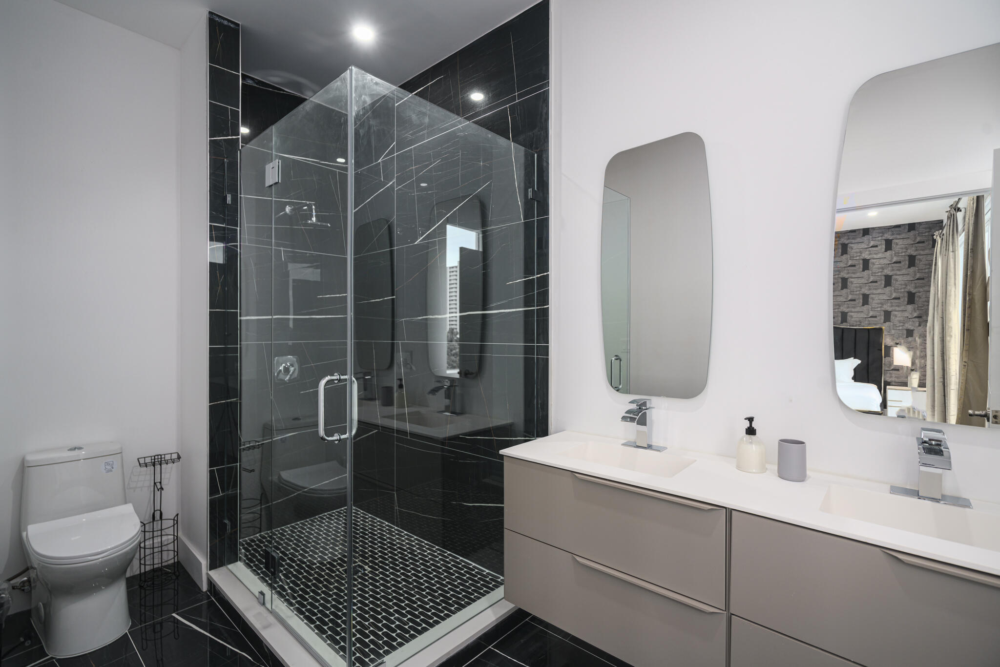 1000 North Riverside Drive Pompano Beach, FL 33062 - Photo 25 of 39 a bathroom with a sink a toilet and shower