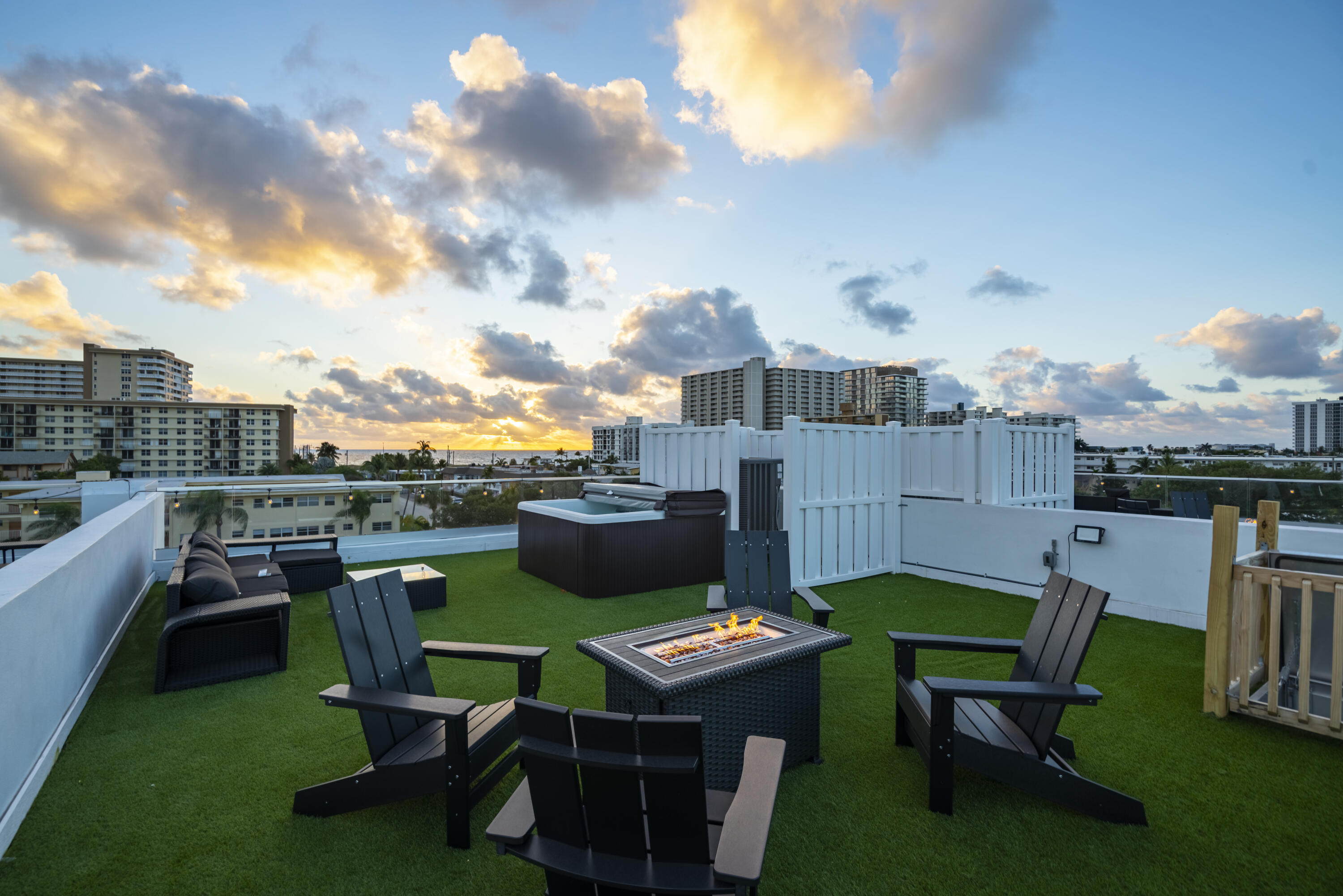 1000 North Riverside Drive Pompano Beach, FL 33062 - Photo 10 of 39 a view of a chairs and table in patio and a yard