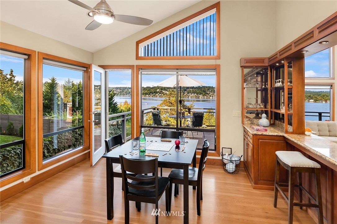 16005 Inglewood Road Northeast Kenmore, WA 98028 - Photo 12 of 39 a bedroom with furniture and a large window