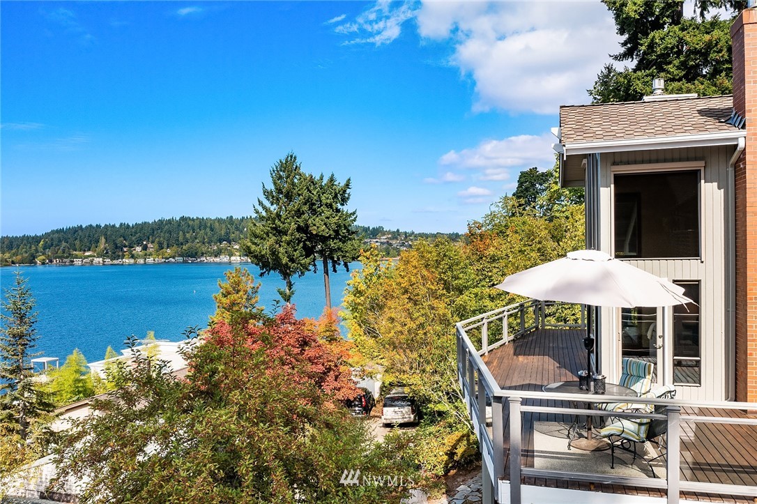 16005 Inglewood Road Northeast Kenmore, WA 98028 - Photo 14 of 39 a view of a chair and tables on the terrace