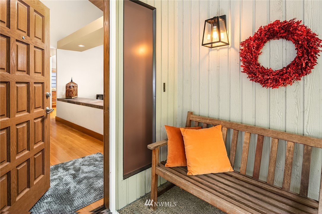 16005 Inglewood Road Northeast Kenmore, WA 98028 - Photo 4 of 39 an aerial view of a house with a lake view