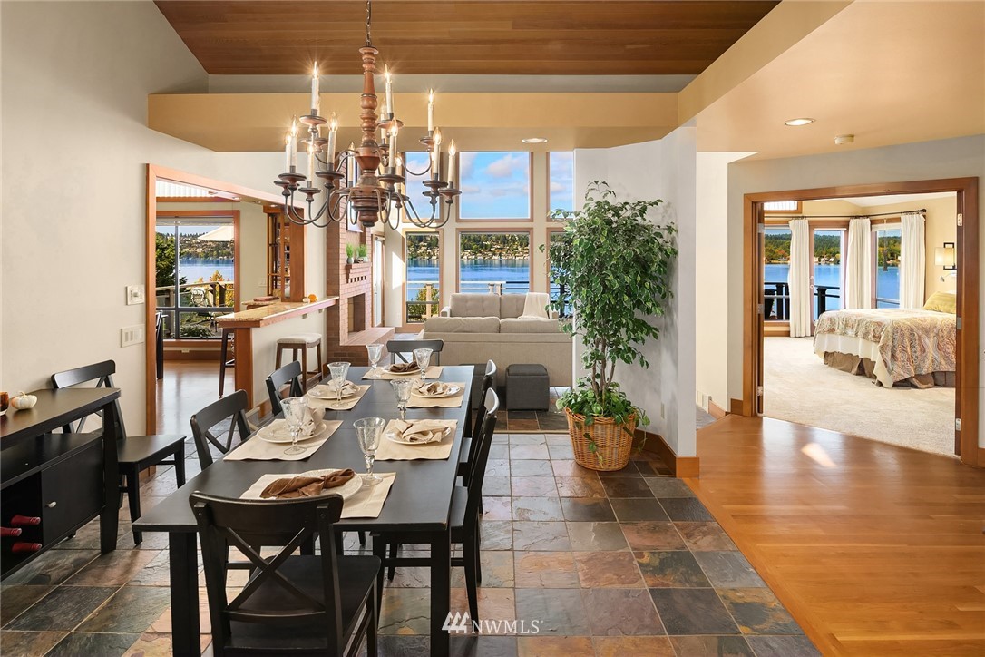 16005 Inglewood Road Northeast Kenmore, WA 98028 - Photo 5 of 39 a front view of a house with a garden