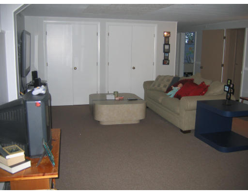 6 Joel Road Marblehead, MA 01945 - Photo 10 of 12 a living room with furniture and a mirror