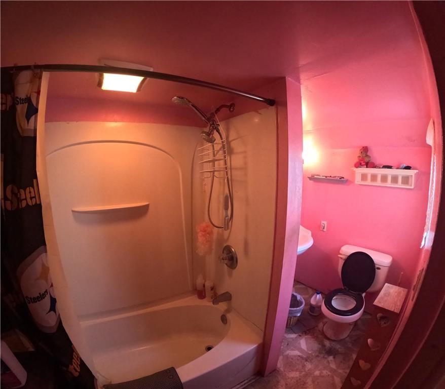 2345 Atmore Street Pittsburgh, PA 15212 - Photo 12 of 17 a bathroom with a shower and a sink