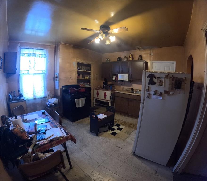 2345 Atmore Street Pittsburgh, PA 15212 - Photo 2 of 17 a room with furniture and a flat screen tv