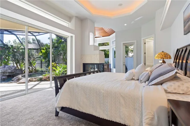 a bed room with a bed and a couch