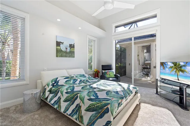 a bedroom with bed and a window