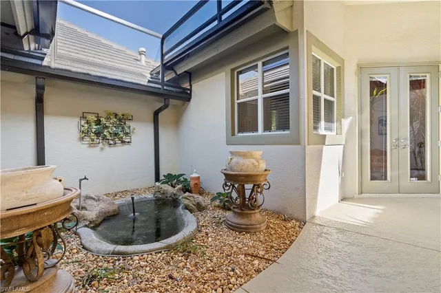 a living room with a couch and a table