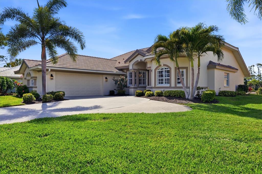 14402 Bridgeview Lane Port Charlotte, FL 33953 - Photo 3 of 93 a front view of house with yard and green space