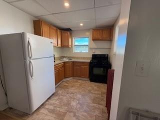 620 Carothers Avenue, Unit 2 Carnegie, PA 15106 - Photo 8 of 8 a kitchen with a refrigerator and a stove top oven