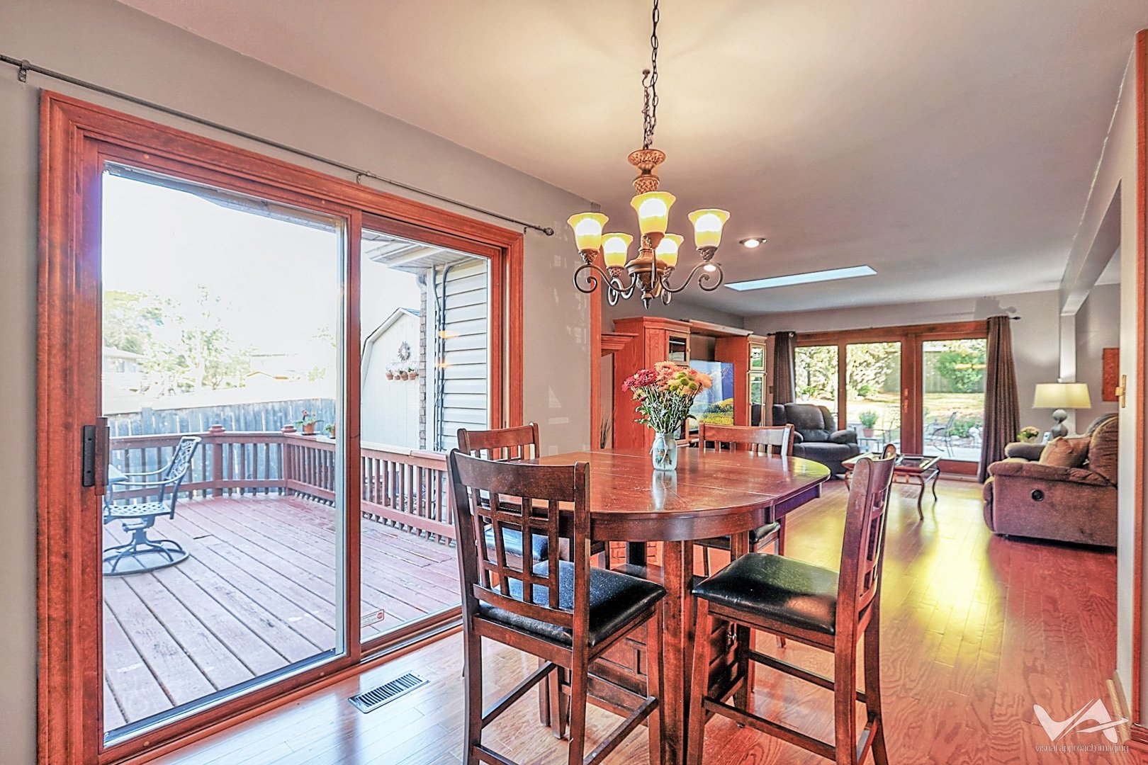1034 Fall Circle Roselle, IL 60172 - Photo 12 of 30 a view of a dining room with furniture wooden floor and chandelier