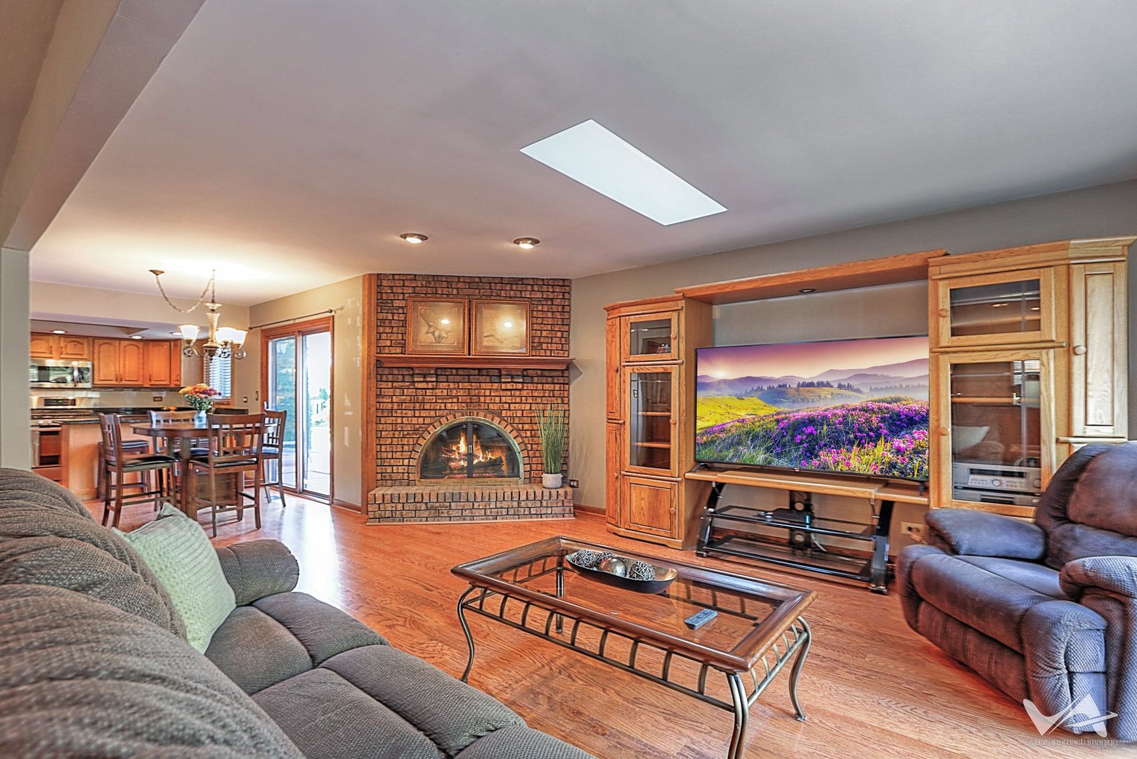 1034 Fall Circle Roselle, IL 60172 - Photo 13 of 30 a living room with furniture and a flat screen tv