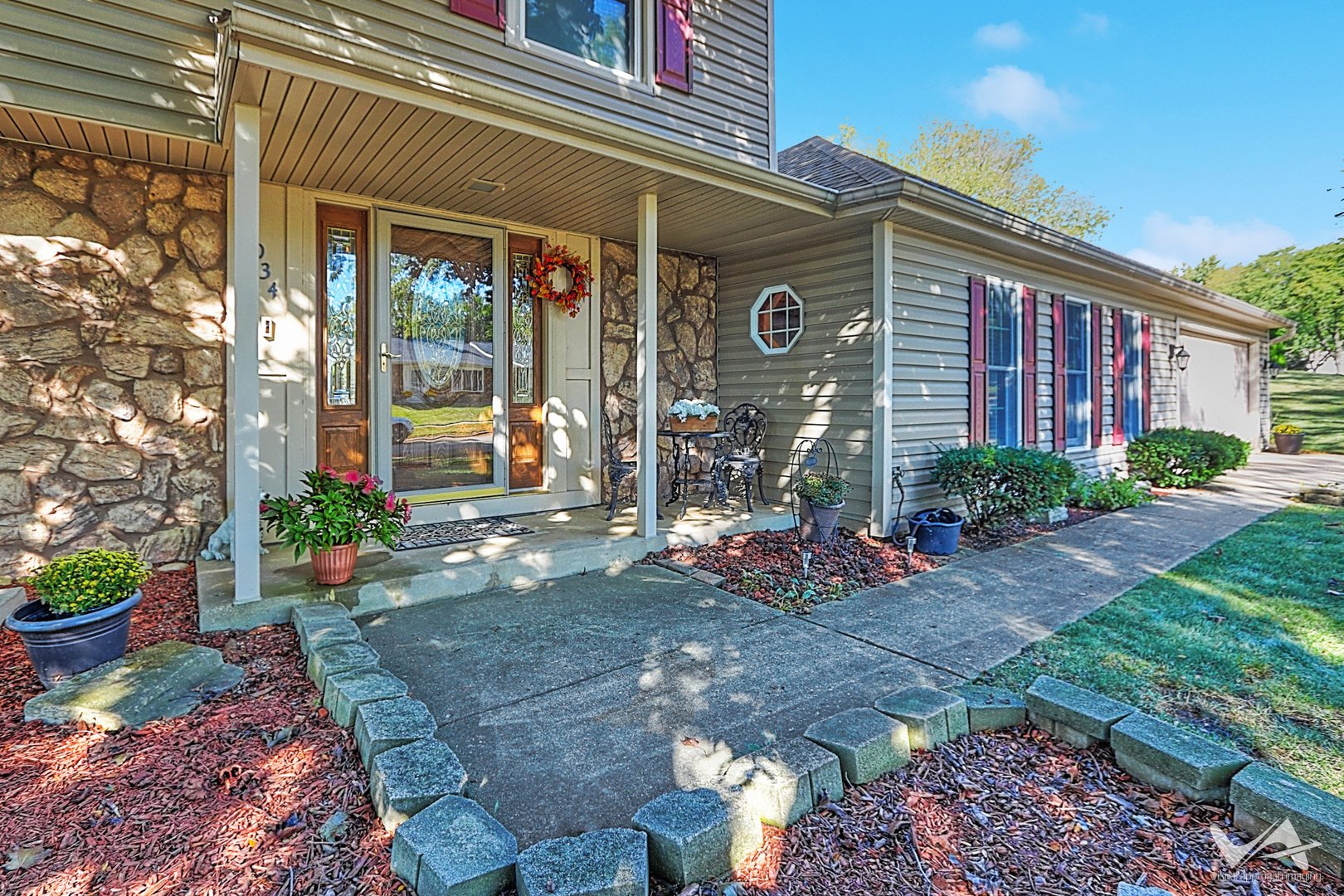 1034 Fall Circle Roselle, IL 60172 - Photo 2 of 30 a view of a house with a yard