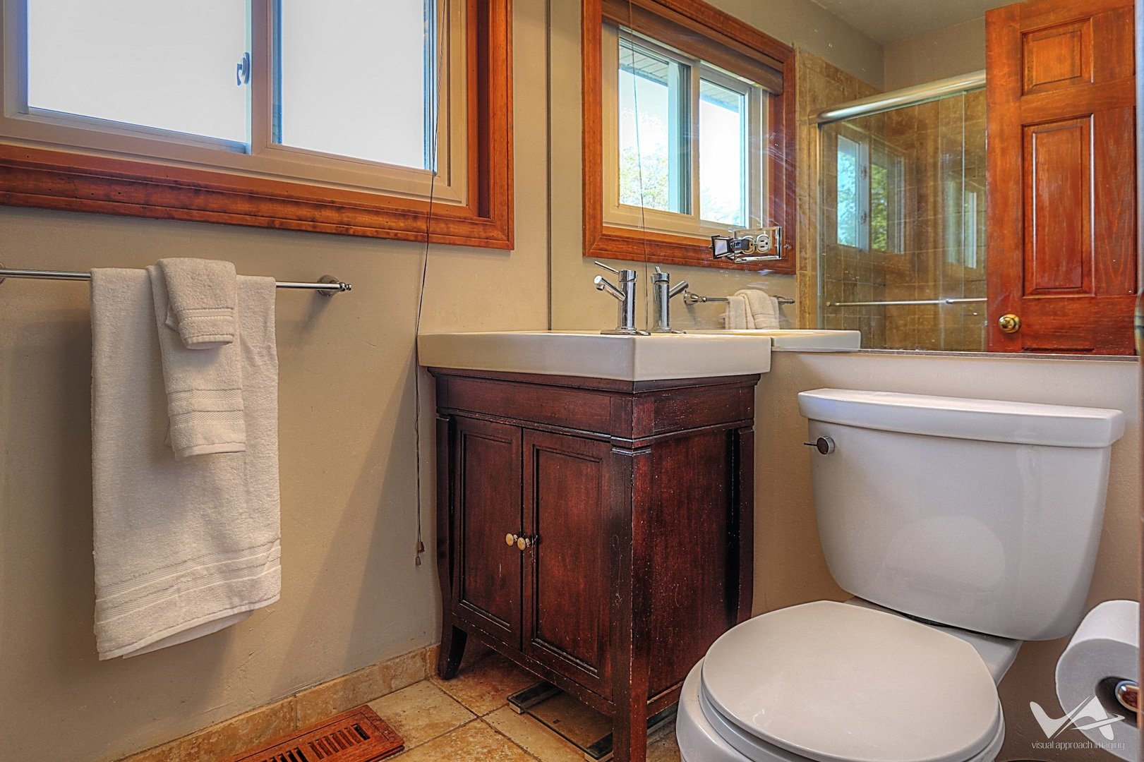 1034 Fall Circle Roselle, IL 60172 - Photo 21 of 30 a bathroom with a granite countertop toilet sink and mirror