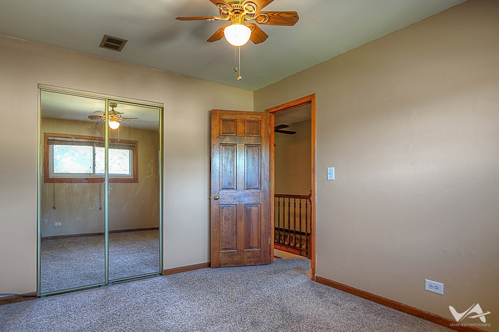 1034 Fall Circle Roselle, IL 60172 - Photo 22 of 30 an empty room with fan and entrance