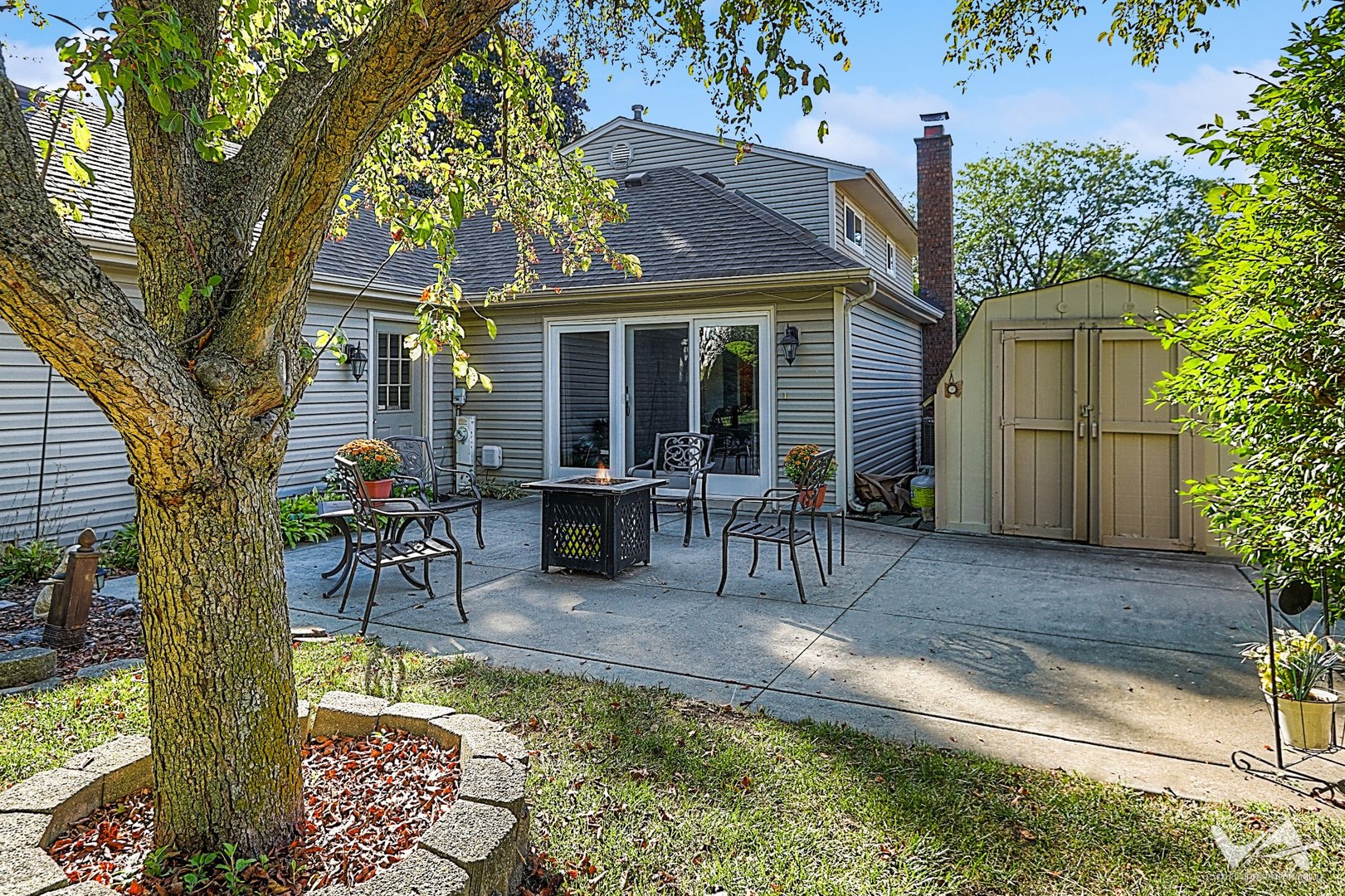 1034 Fall Circle Roselle, IL 60172 - Photo 28 of 30 a view of a dinning table and chairs in patio