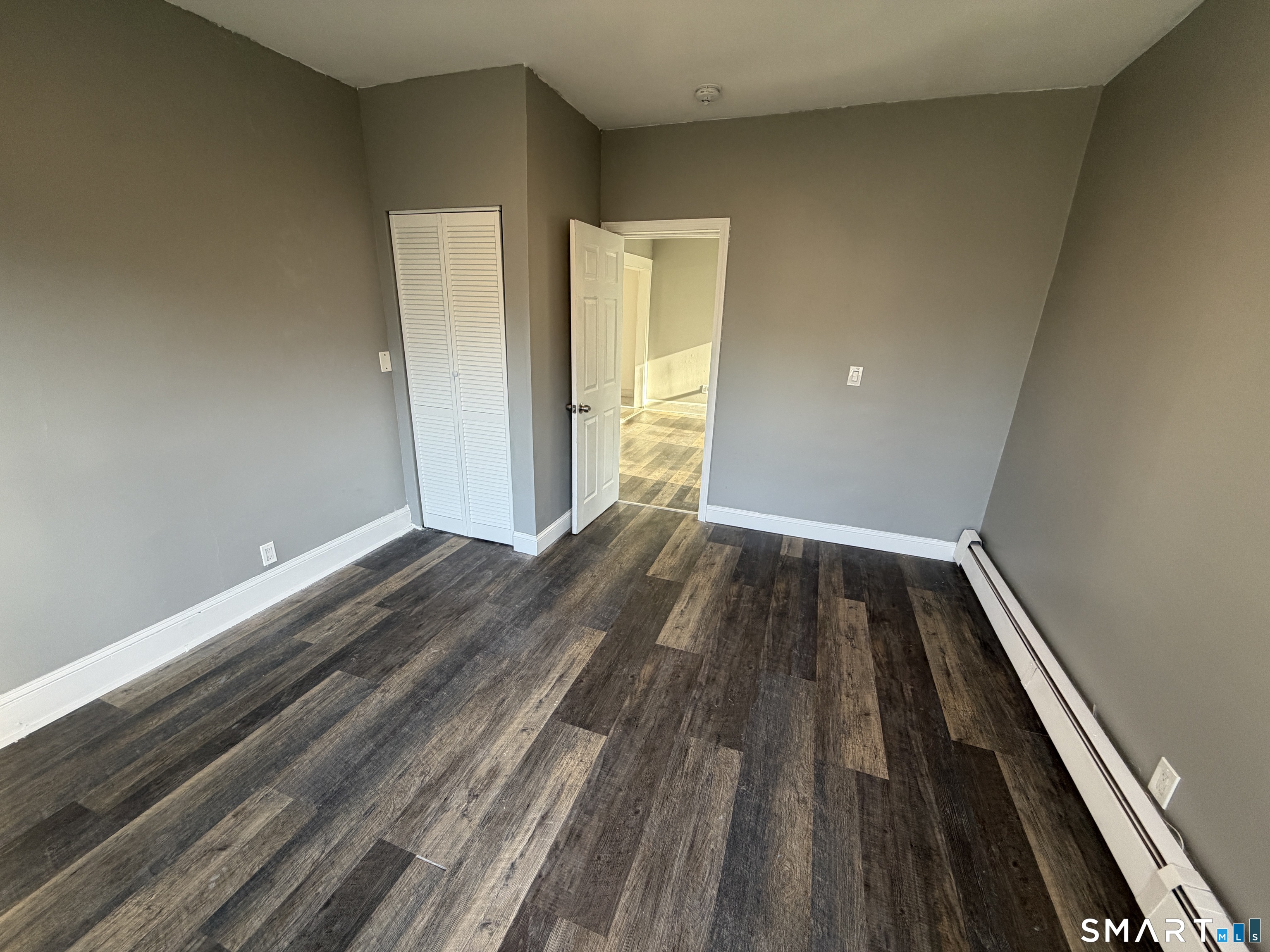 402 Allen Street New Britain, CT 06053 - Photo 14 of 14 a view of wooden floor in a room