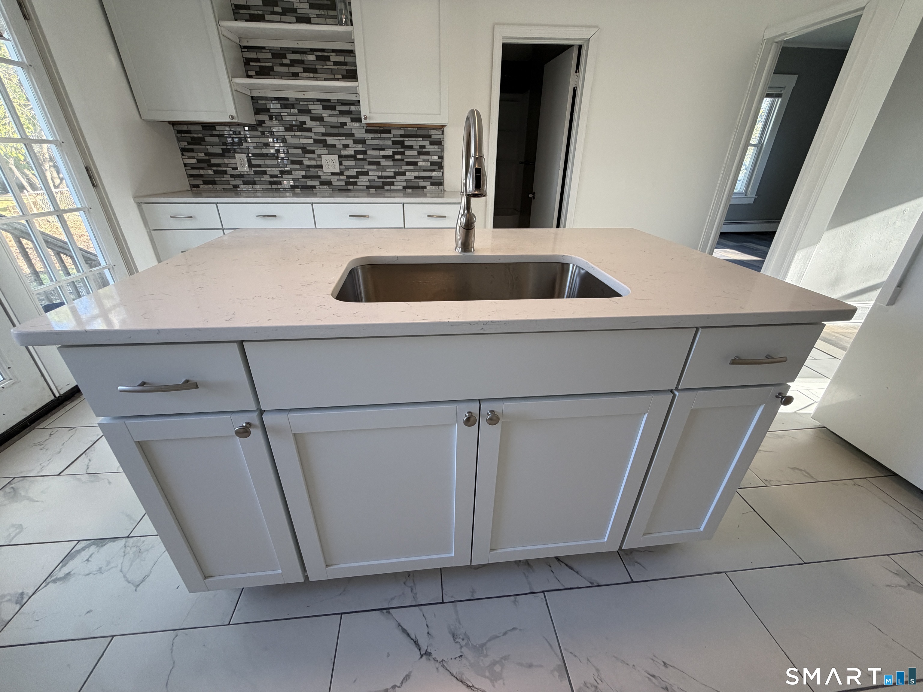 402 Allen Street New Britain, CT 06053 - Photo 3 of 14 a view of kitchen with white cabinets