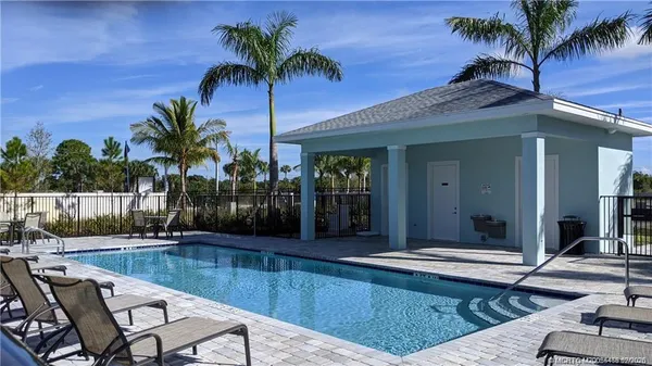 a view of outdoor space with palm trees