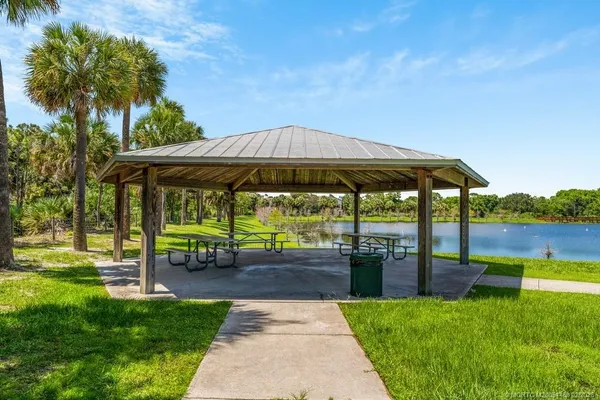 a view of a lake with a yard
