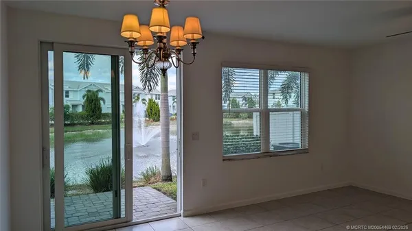 a view of a balcony with a chandelier