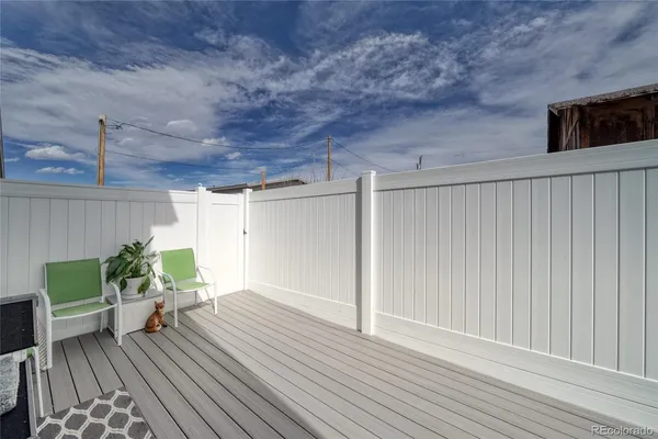 a bedroom with a bed and cabinets