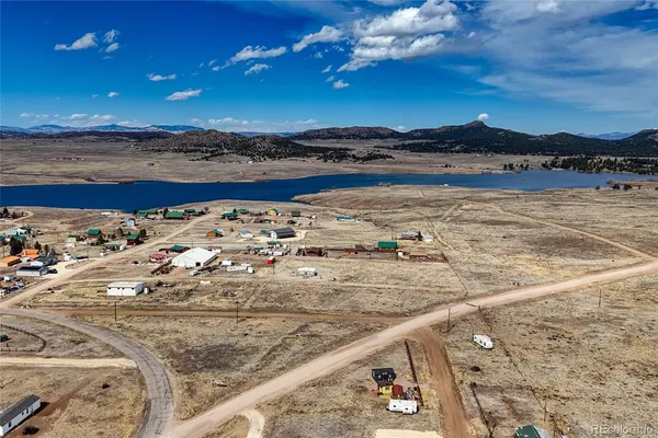 a view of an ocean beach and mountain