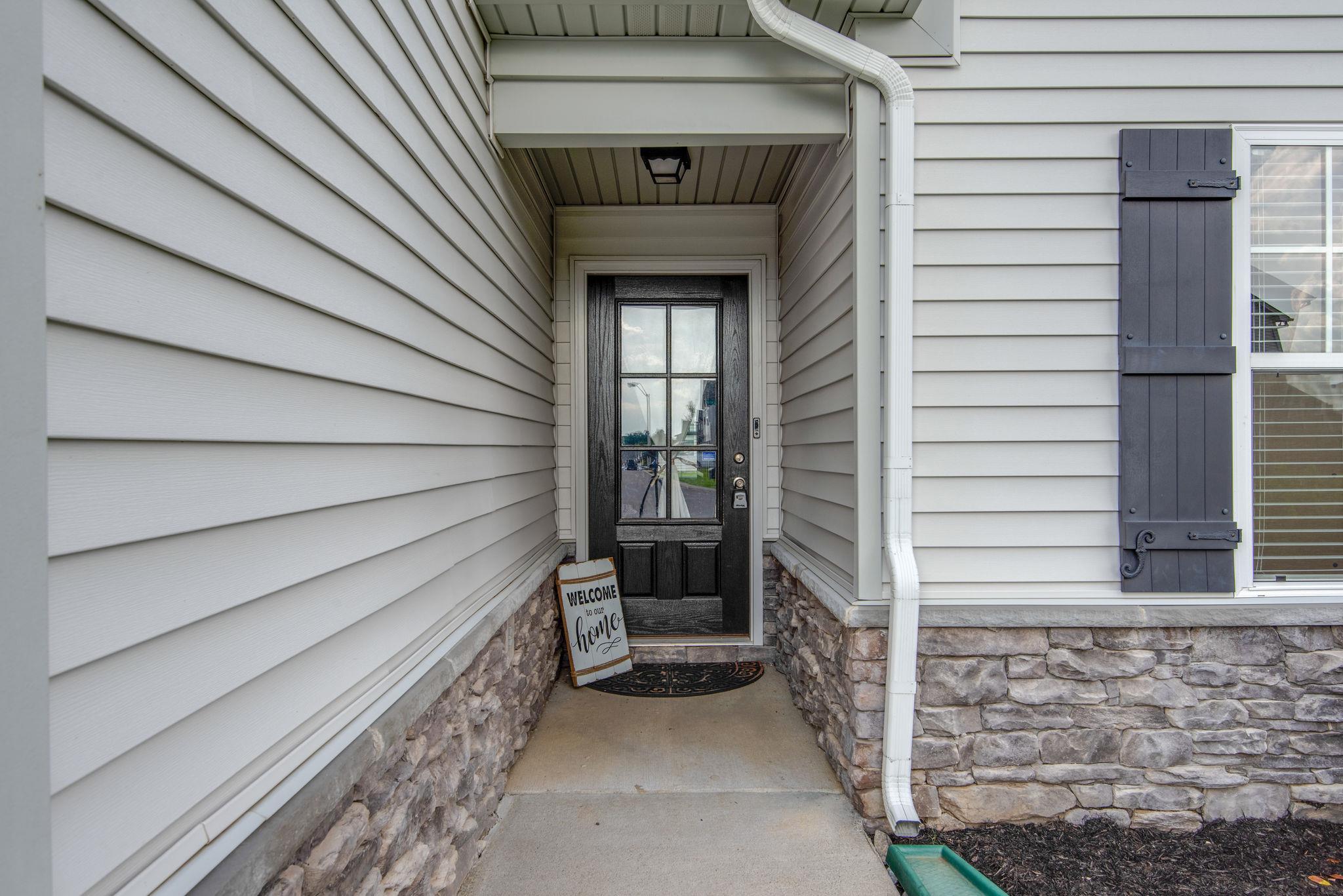 Entryway with stone accents.