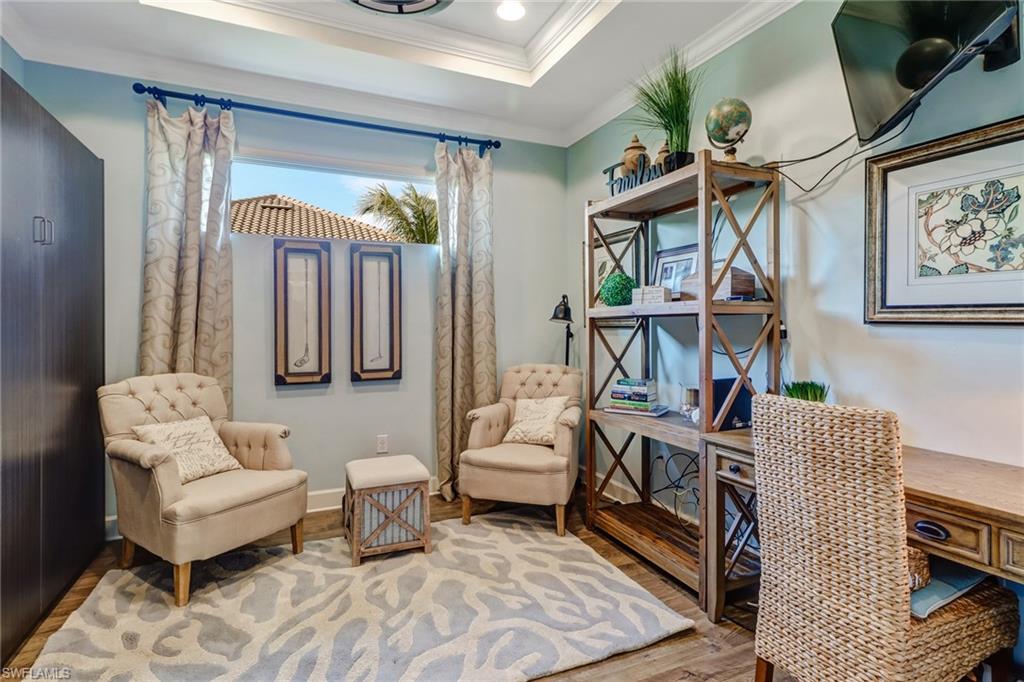 3280 Miyagi Lane Naples, FL 34114 - Photo 17 of 25 a living room with furniture