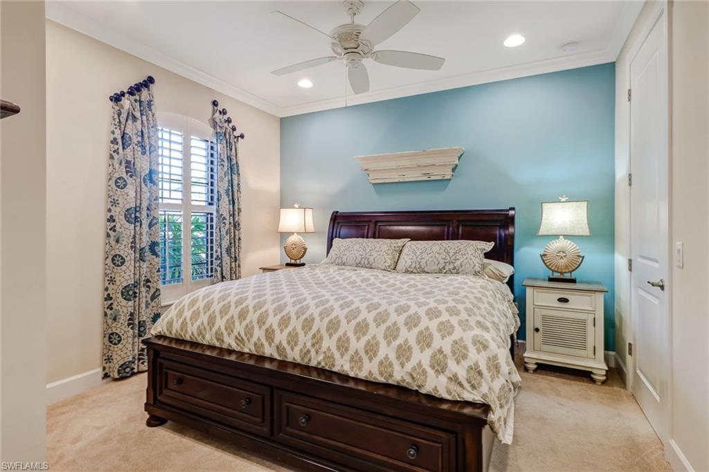 3280 Miyagi Lane Naples, FL 34114 - Photo 18 of 25 a bedroom with a bed and a window