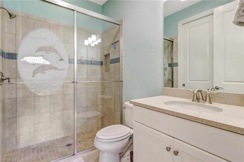 3280 Miyagi Lane Naples, FL 34114 - Photo 19 of 25 a bathroom with a sink toilet and shower