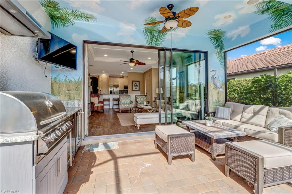 3280 Miyagi Lane Naples, FL 34114 - Photo 23 of 25 a living room with furniture and a large window