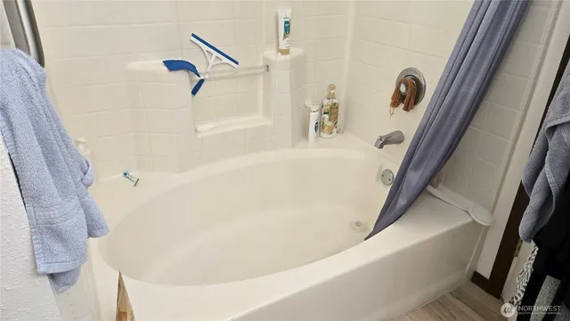 a bathroom with a bathtub