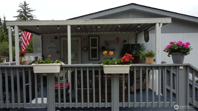 a front view of house with deck