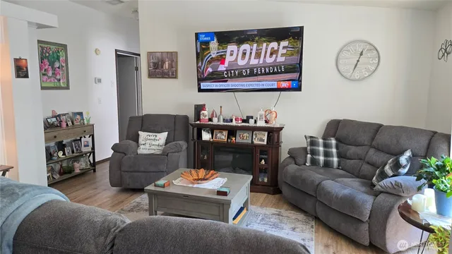 a living room with furniture and a couch